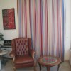 cavalletti-tendaggi-poltrona